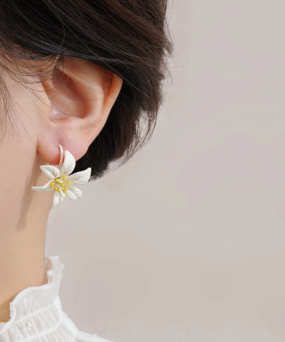 Beautiful Yellow Asymmetricar Lily Floral Stud Earrings FA338