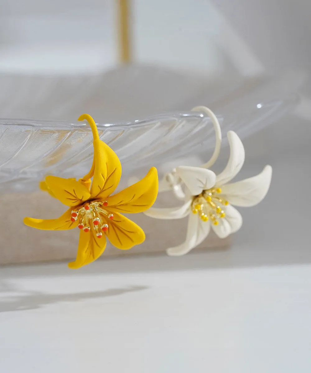 Beautiful Yellow Asymmetricar Lily Floral Stud Earrings FA338