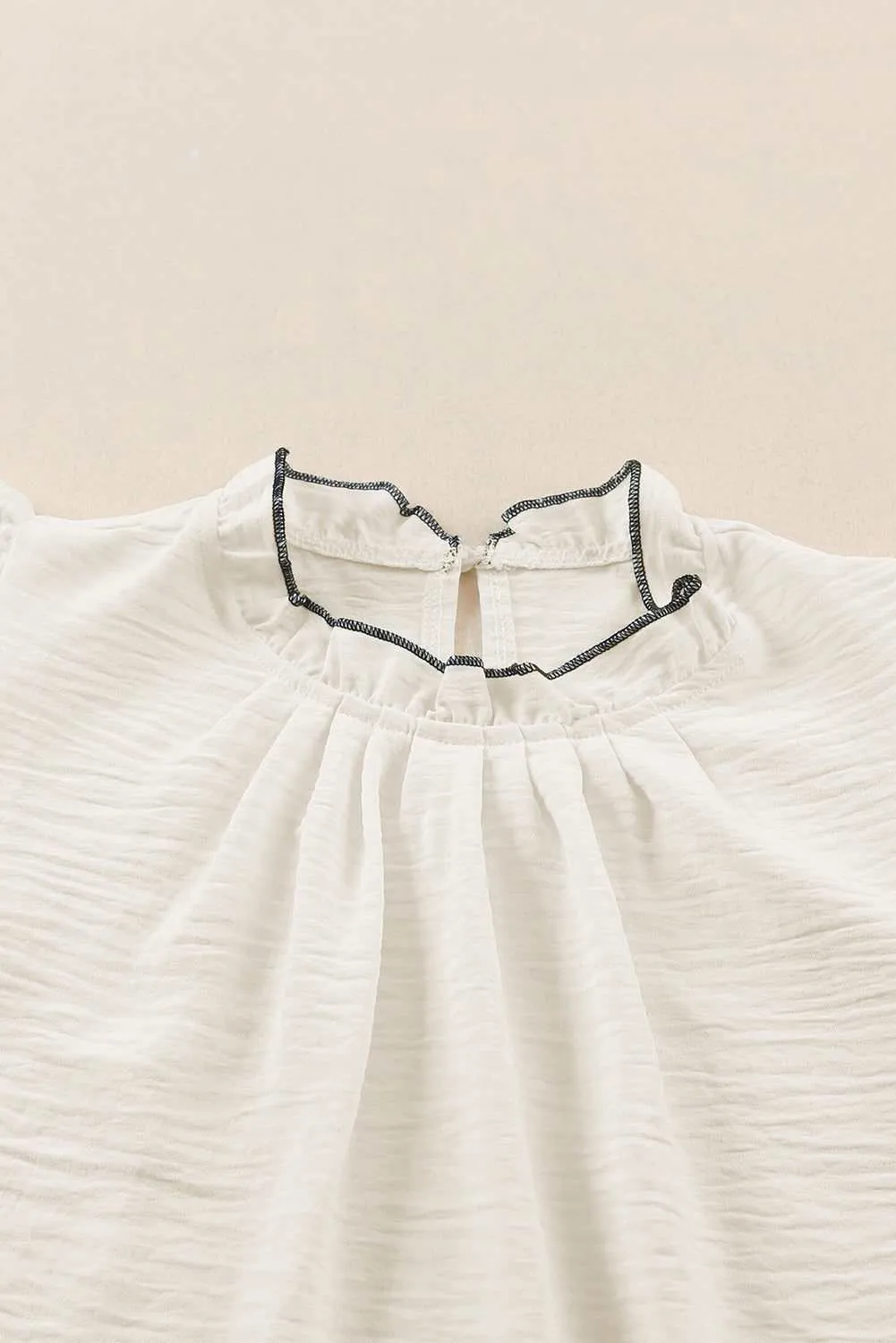 White Contrast Trim Ruffled Sleeveless Blouse