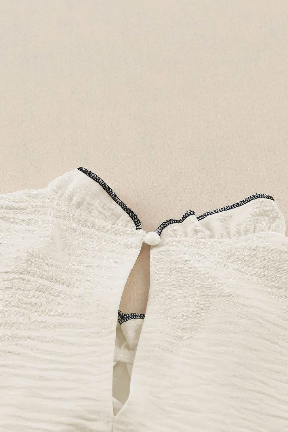 White Contrast Trim Ruffled Sleeveless Blouse
